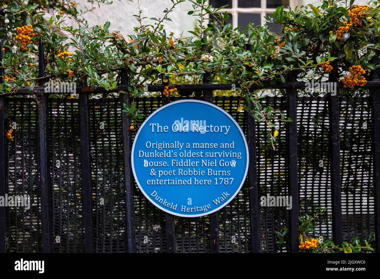 Dunkeld, Scotland - October 11th 2021: A blue plaque noting the history of The Old Rectory in the beautiful town of Dunkeld, Scotland. Stock Photo