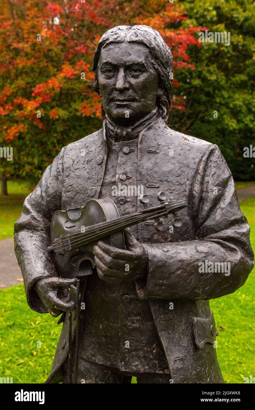 Dunkeld, Scotland - October 11th 2021: A statue of Niel Gow in the town of Dunkeld in Scotland, UK.  Gow was the most famous Scottish fiddler of the 1 Stock Photo