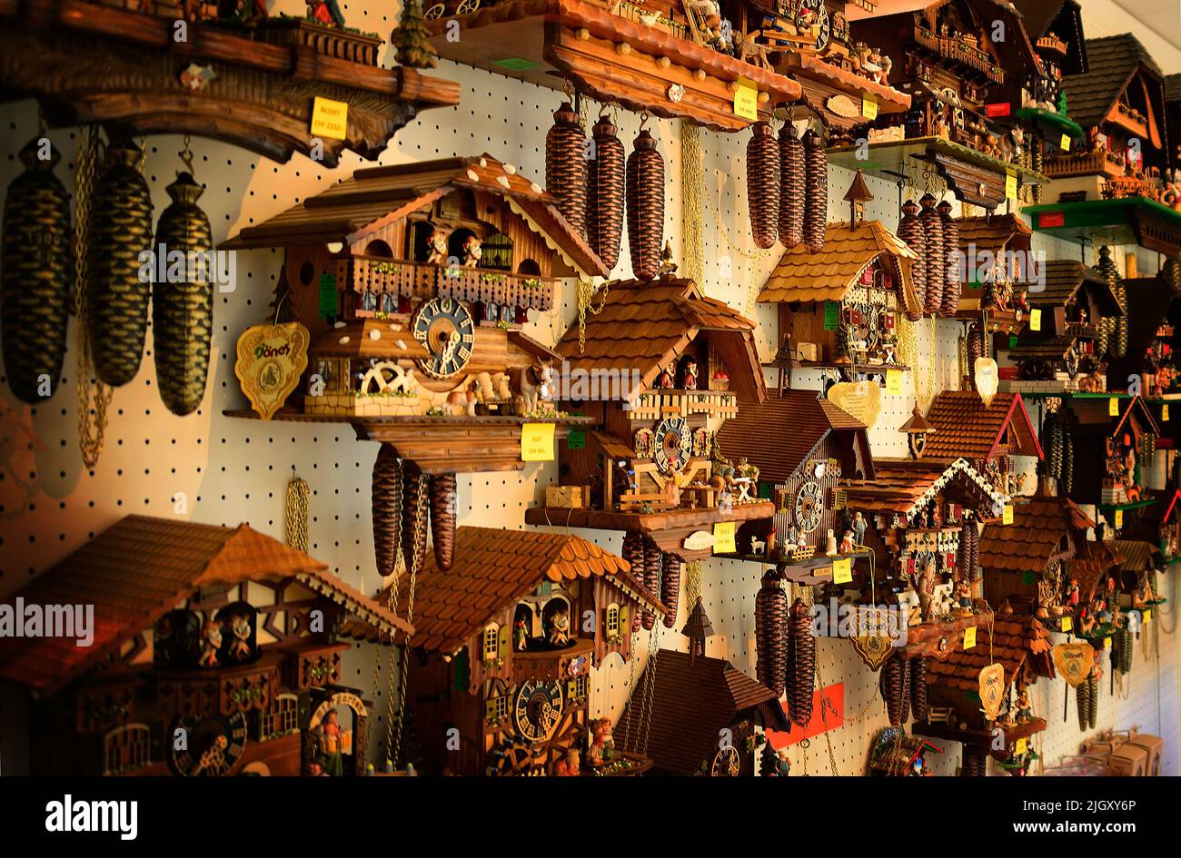 An array of cuckoo clocks in a shop in Interlaken Switzerland Stock