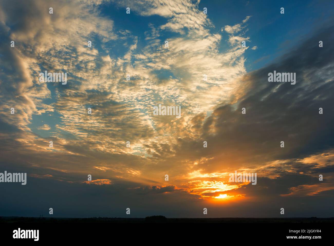 Background picture - bright dramatic sky with clouds at sunset in ...