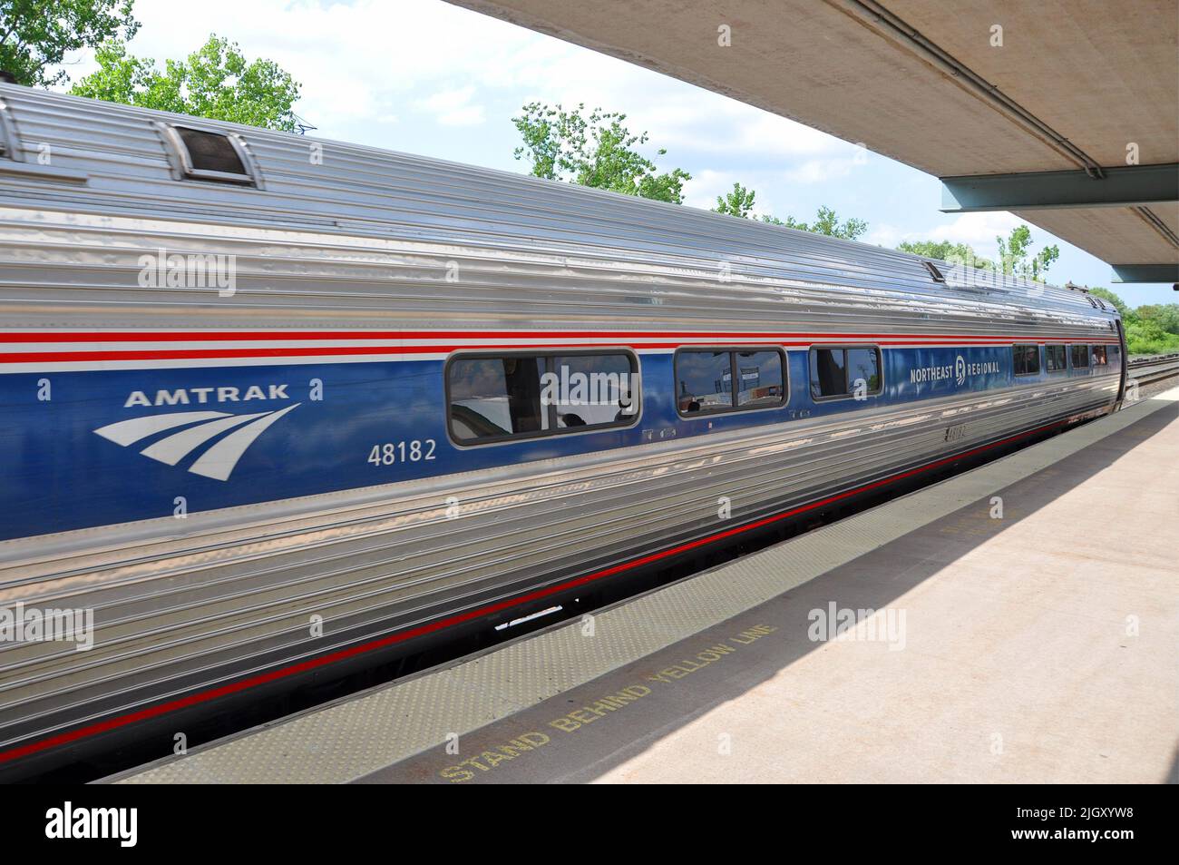 Amtrak Amfleet I coach class passenger car 48182 with phase VI paint scheme in Syracuse Station