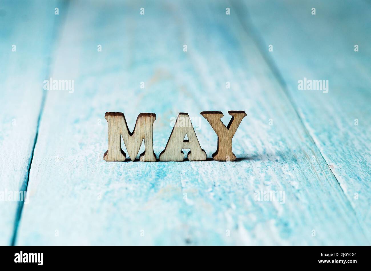 The month of January is large on a blue background. The names of the ...