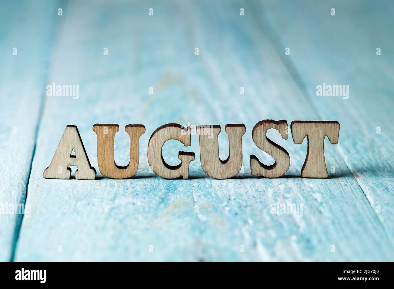 The month of January is large on a blue background. The names of the ...