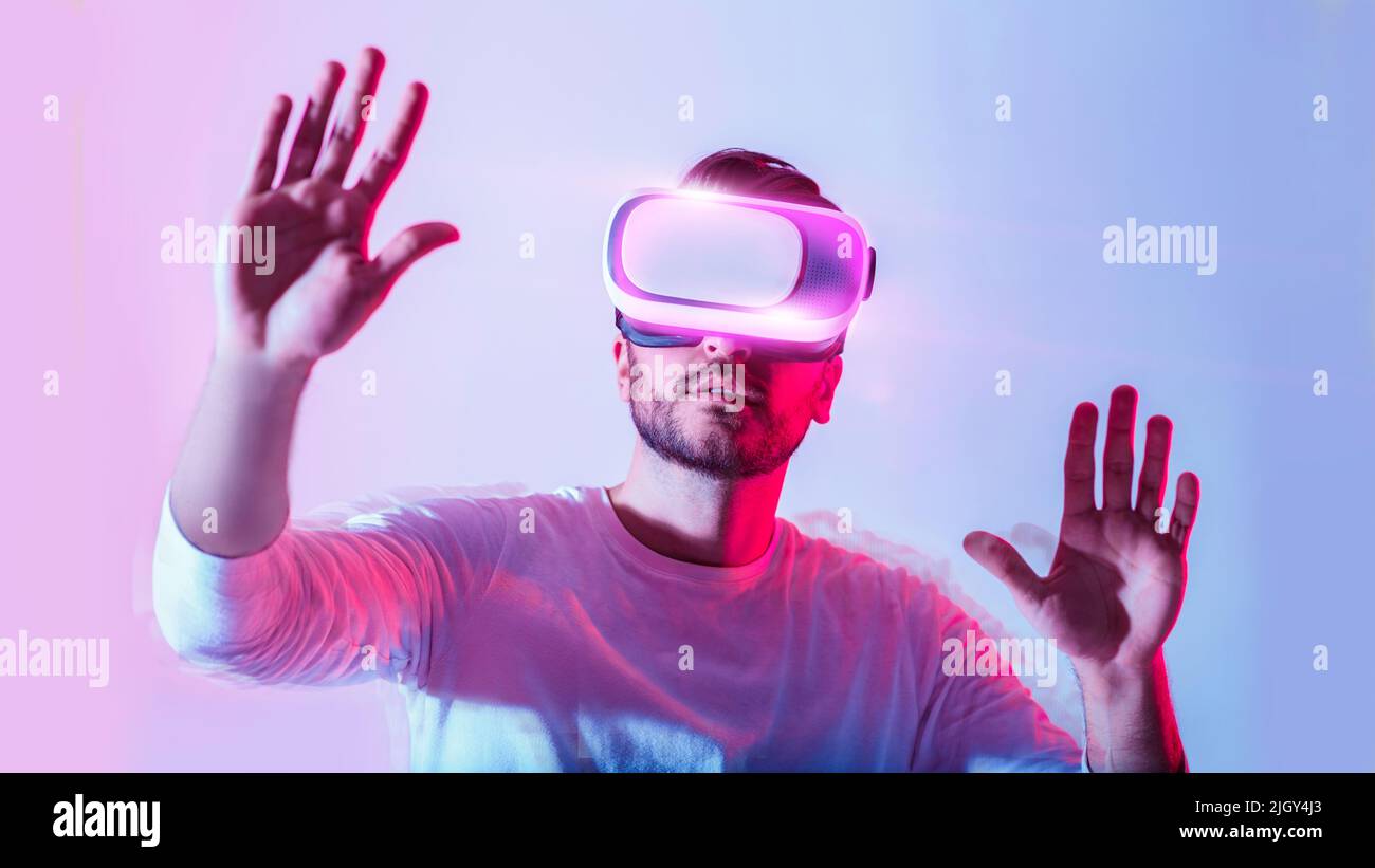 Modern digital entertainment. Man uses virtual glasses Stock Photo