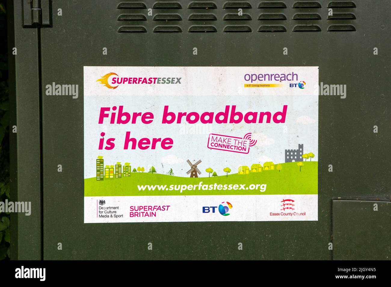 Essex, UK - September 6th 2021: A sign from communication company BT, pasted on a street cabinet in Essex, UK, advertising the arrival of Fibre Optic Stock Photo