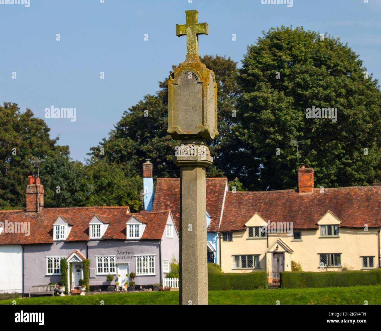 Essex, UK - September 6th 2021: Close-up of the cross on the War Memorial in the beautiful village of Finchingfield in Essex, UK.  It is dedicated to Stock Photo