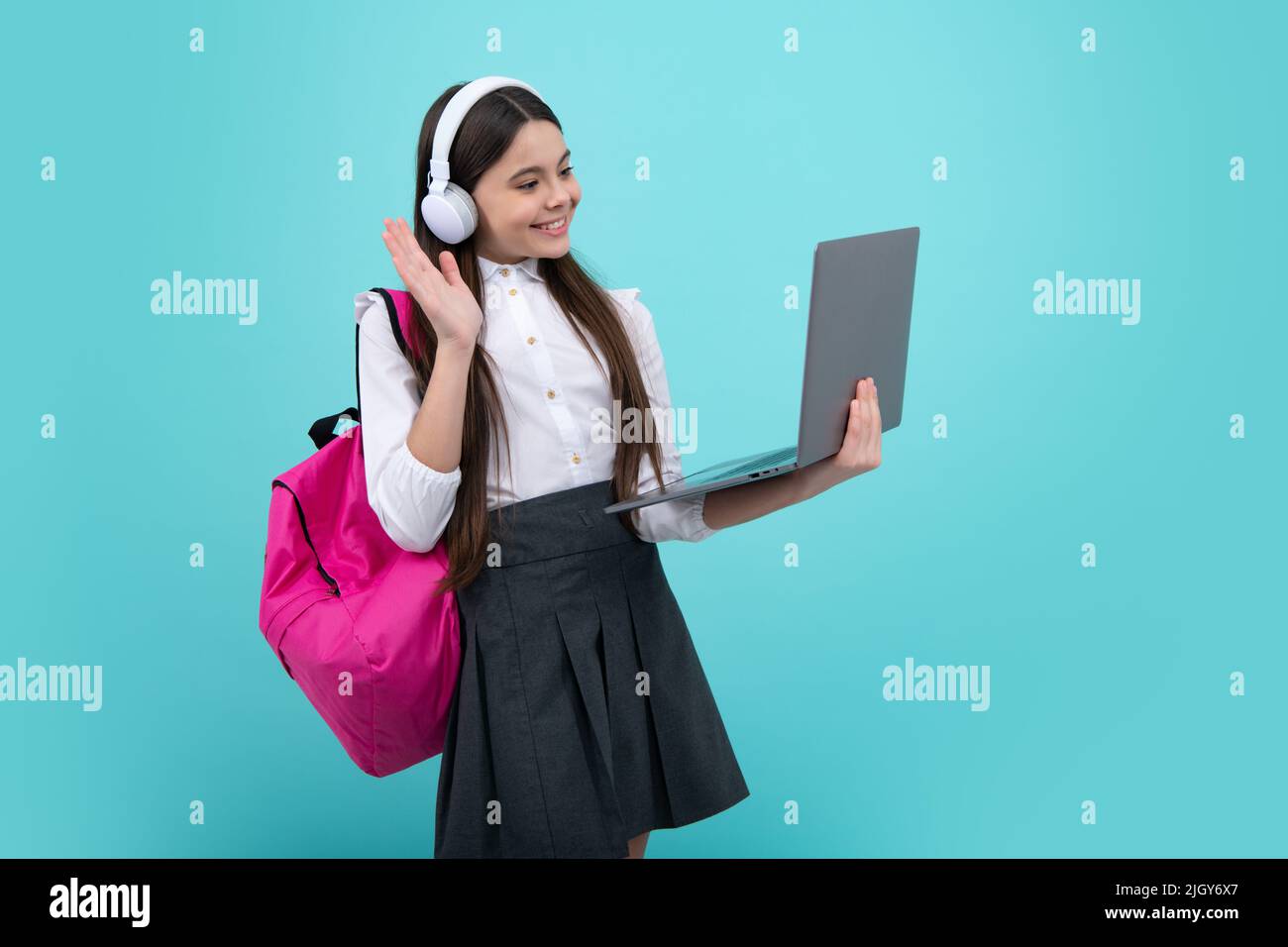Back to school. Teenager schoolgirl in school uniform with bagpack ...