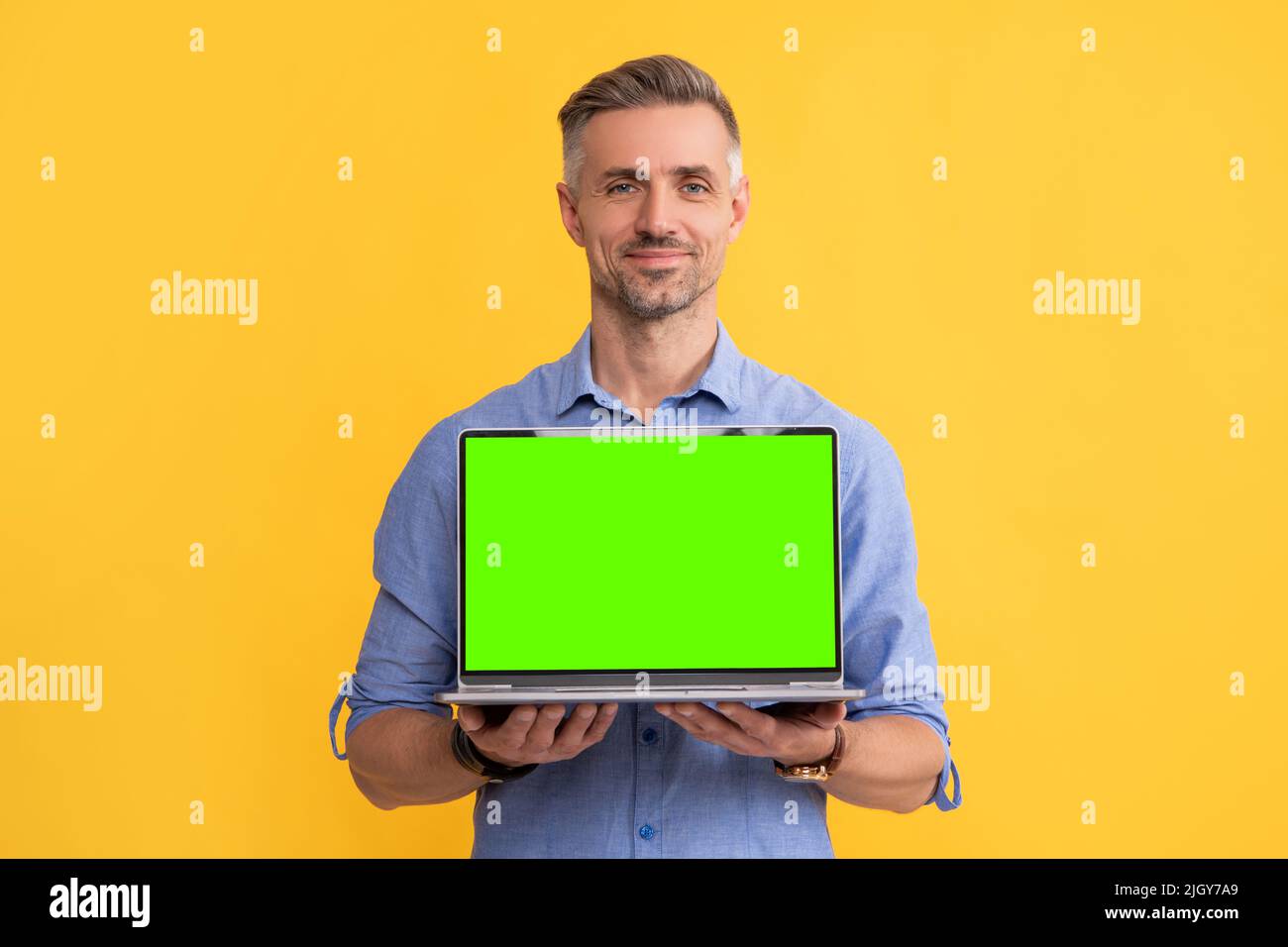 smiling businessman presenting product. presentation on computer. office manager Stock Photo