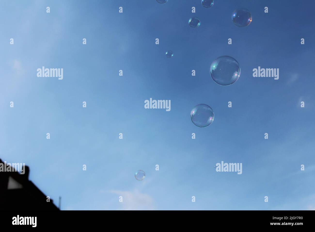 Bubbles floating up to the sky Stock Photo Alamy