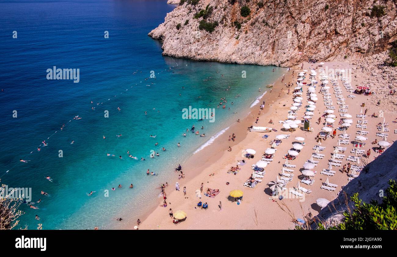Kaputas beach in Antalya region, Turkey with clear turquoise water, sun umbrellas and sandy beach Stock Photo