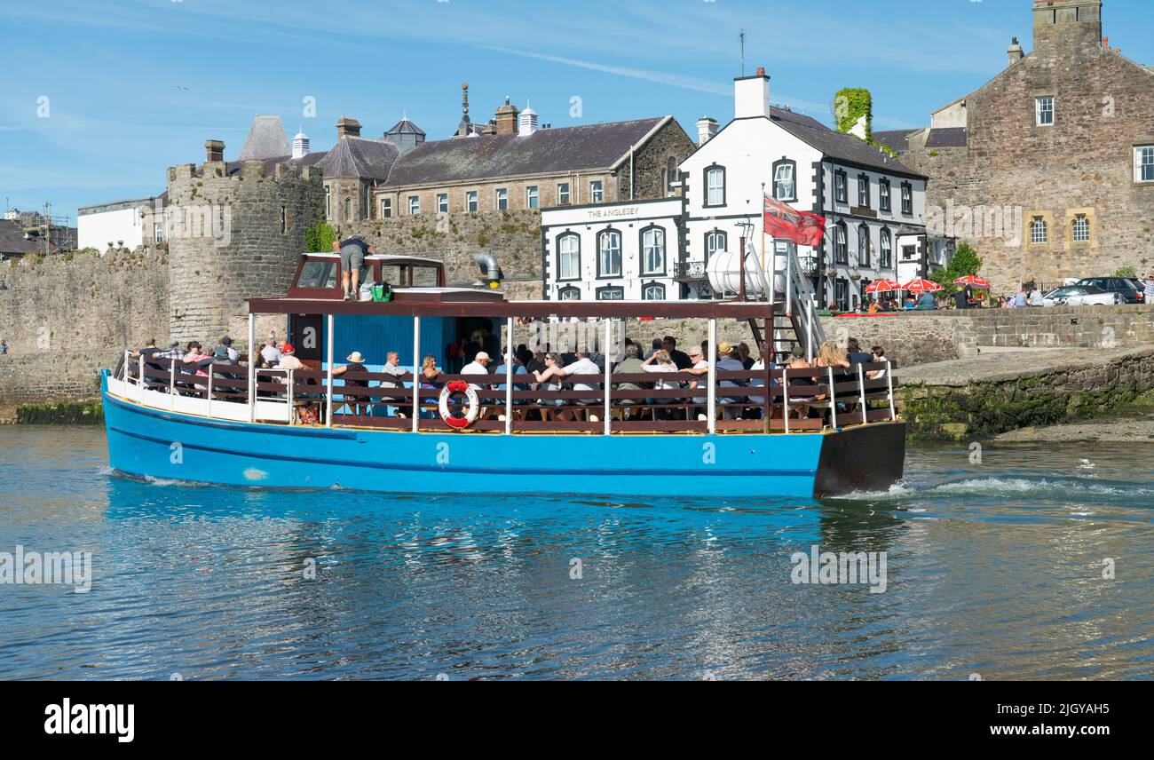 The Queen of the sea pleasure boat on the river Seiont, that runs into the Menai Straits, by