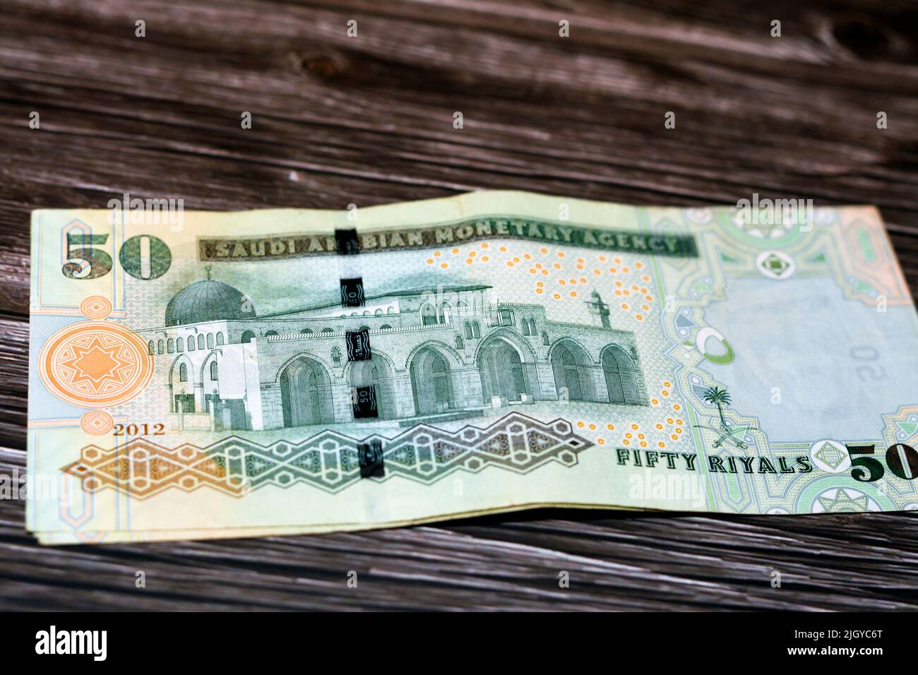 Stack of the reverse side of Saudi Arabia 50 SAR fifty Saudi riyals cash  money banknote with the photo of Al Aqsa Mosque in Jerusalem isolated on a  wo Stock Photo - Alamy