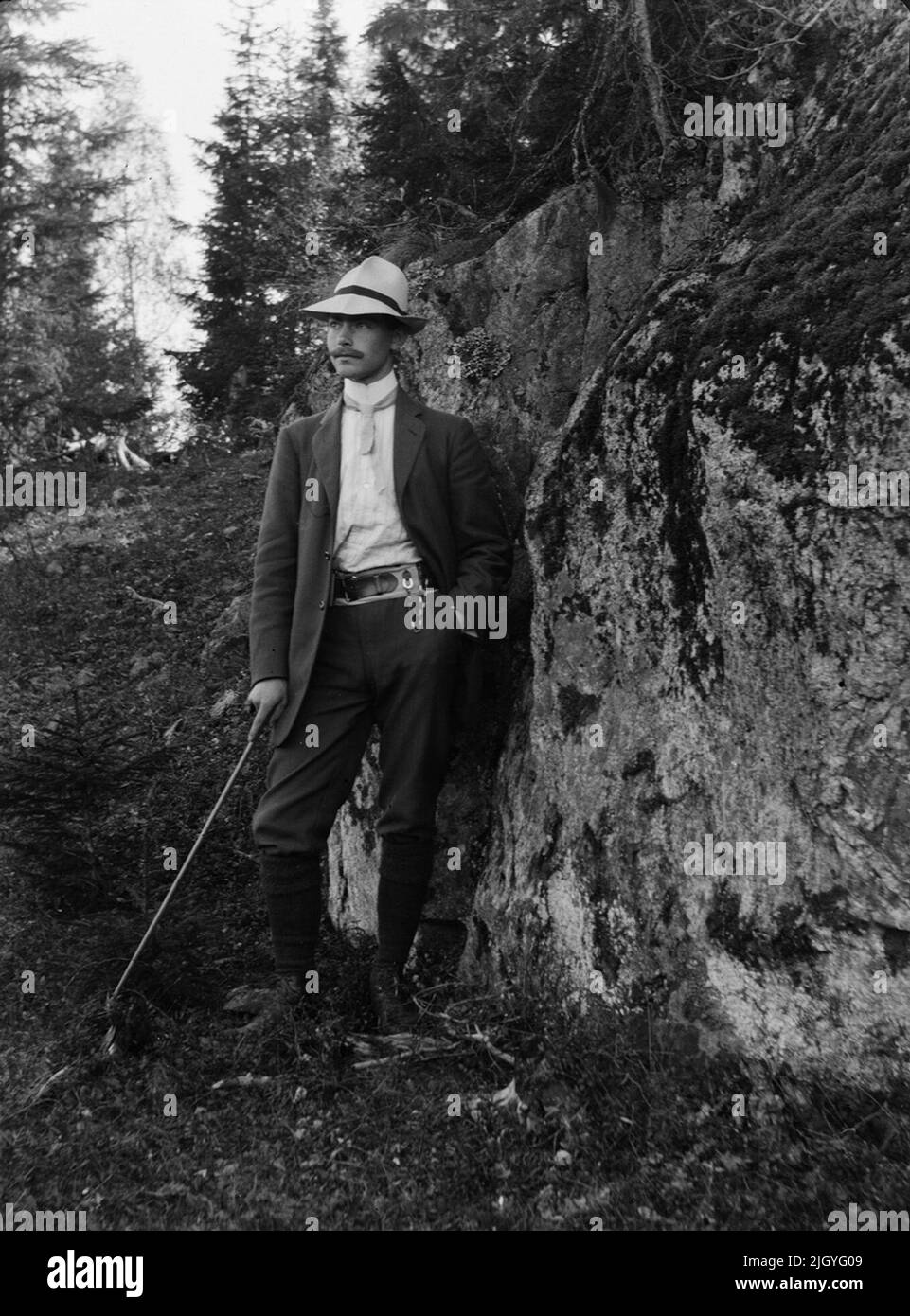 Josef Ärnström in the forest. Josef Ärnström's image collection was acquired by the Upplands Museum 2011.Josef Ärnström was born in 1887 in Keps, Hållnäs parish, Uppland. He was married to Nora Selldin, born in Timrå, Medelpad. Both Josef and his wife Nora took their degrees around 1910 at the teacher's seminar in Uppsala. In Medelpad, the couple received their first teacher services at Berge school as a newlyweds about 1910-12. The relocation then moved on to Lapland where Josef was employed in Toulleuvaara between about 1913-18. Joseph ended his career as an exercise teacher from about 1920 Stock Photo