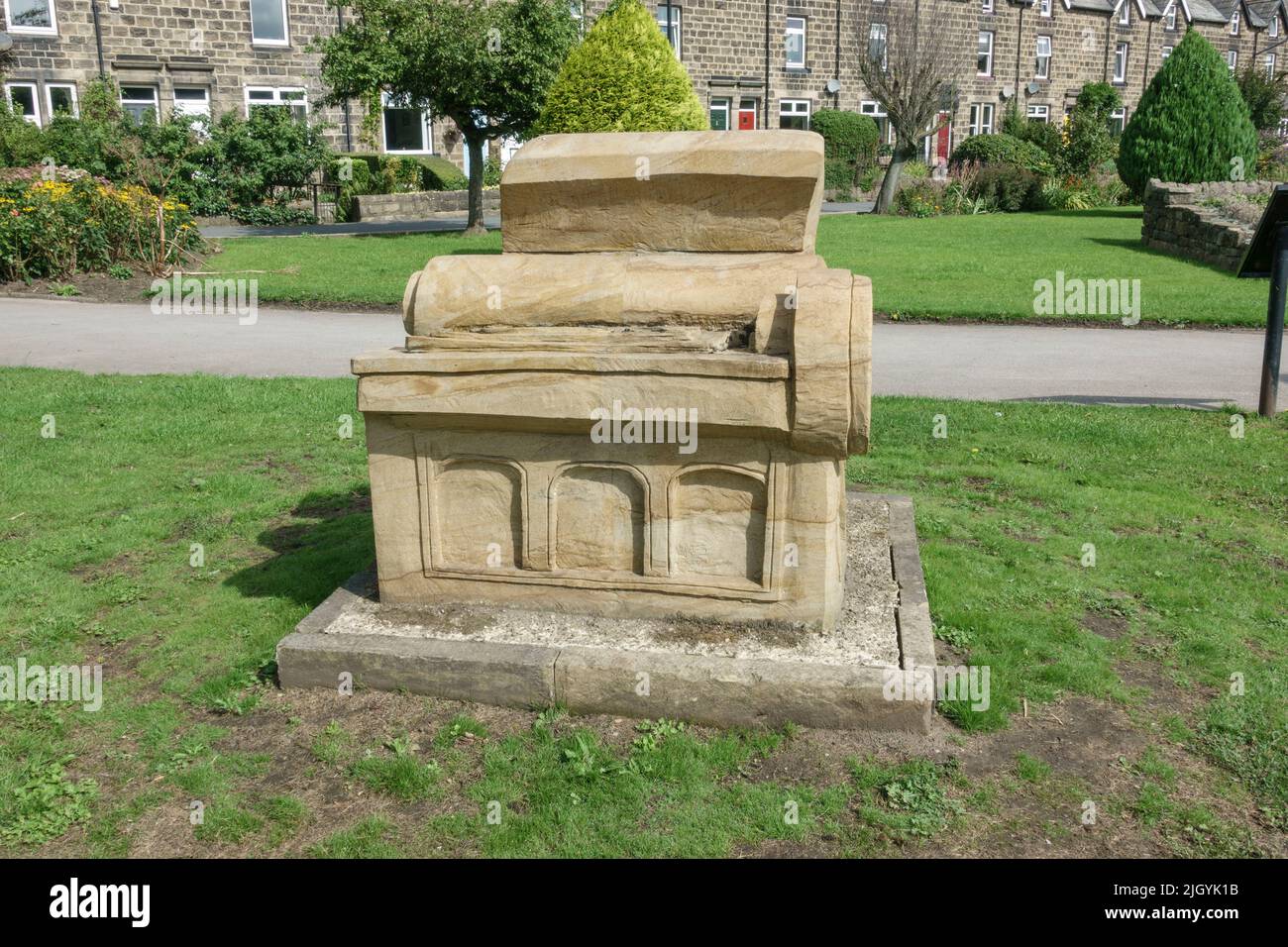 'The 3Rs – Homage to the Wharfedale Press' sandstone sculpture beside the River Wharfe in Otley, West Yorkshire, UK. Stock Photo