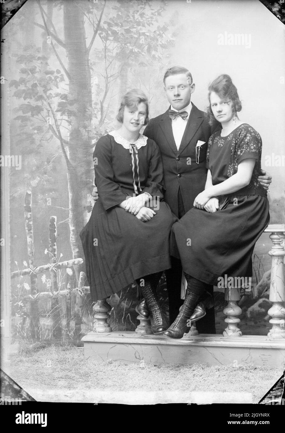 Two women and one man, Östhammar, Uppland. Historical event, name related to Objek: Andersson, Emilia Stock Photo