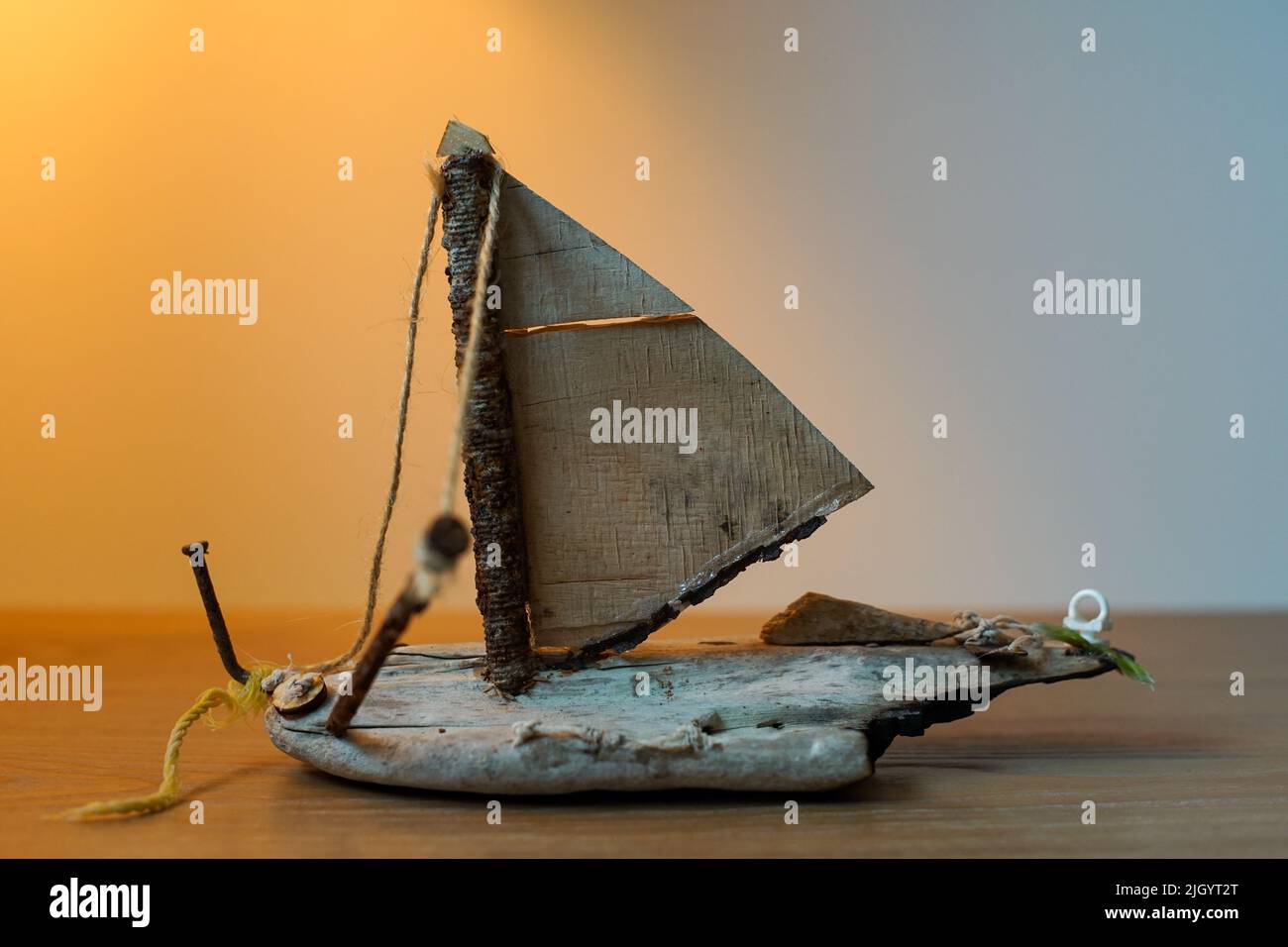 A Bark Ship Craft On A Wooden Table Stock Photo - Alamy