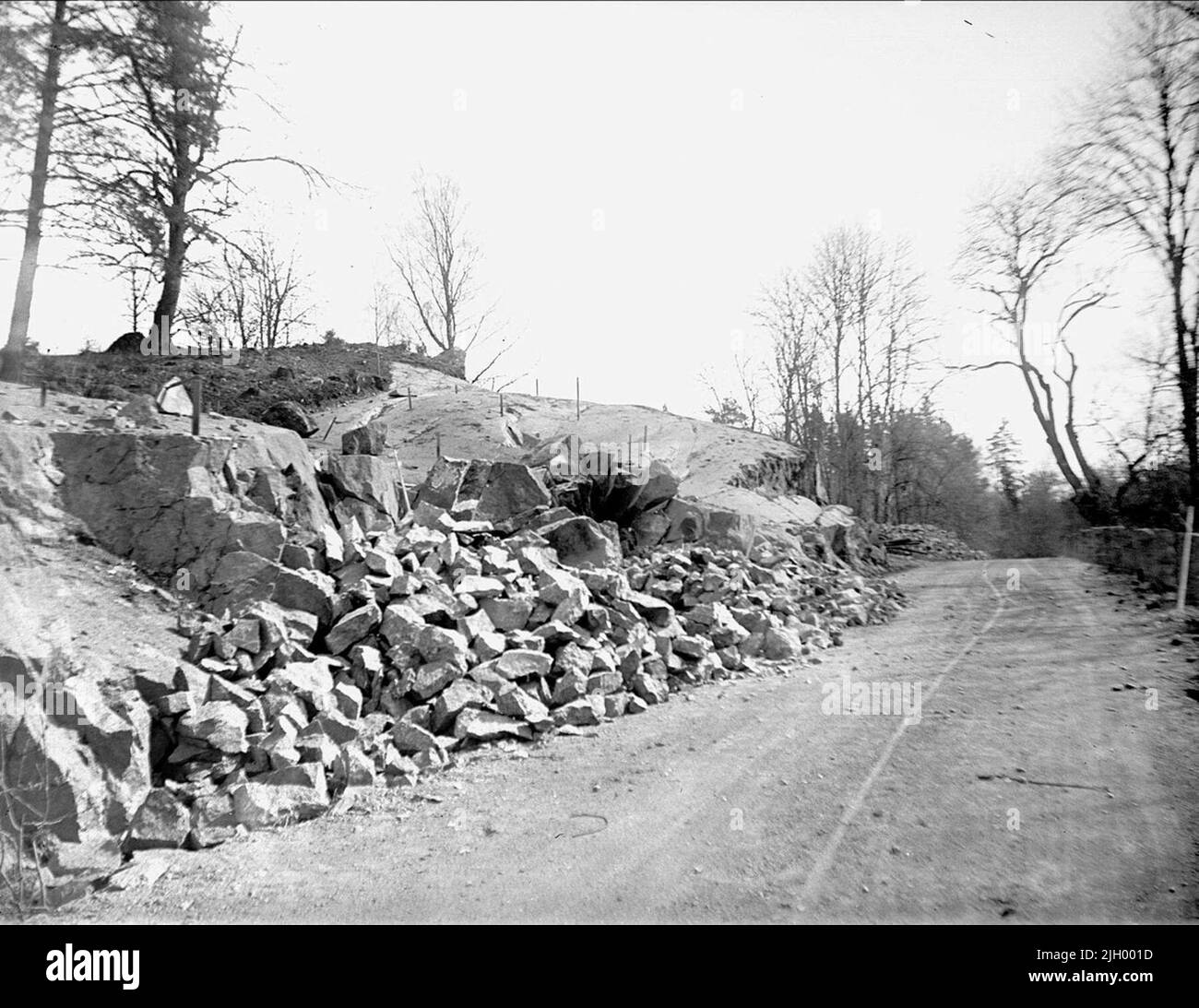 Probably road construction with rock blasting, Lurbo, Gottsunda, Uppsala 1933. Probably road construction with rock blasting, Lurbo, Gottsunda, Uppsala 1933 Stock Photo