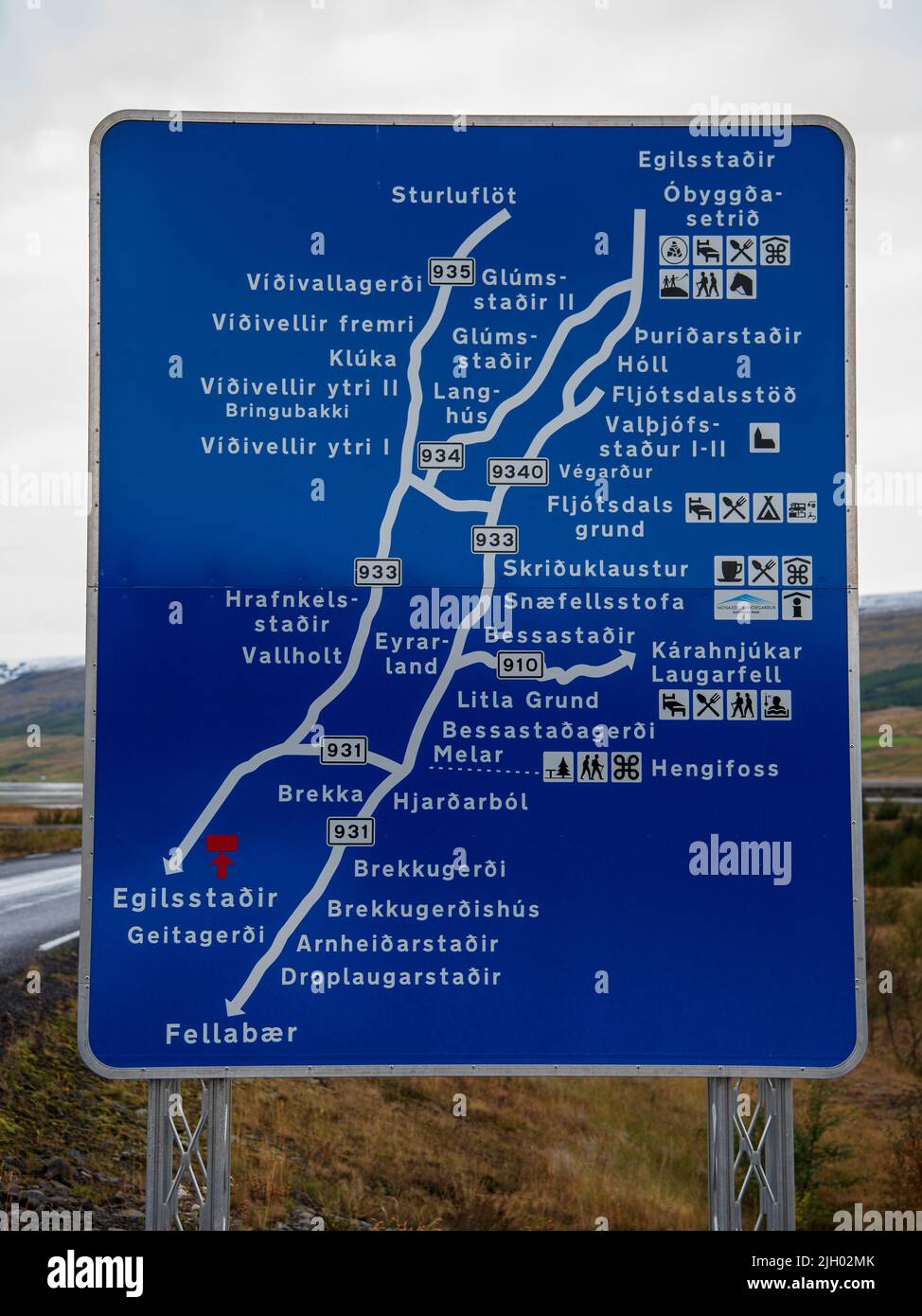 Road sign at the south end of lake Lagarfljót in east Iceland, displaying locations of farms and villages in the area. Stock Photo