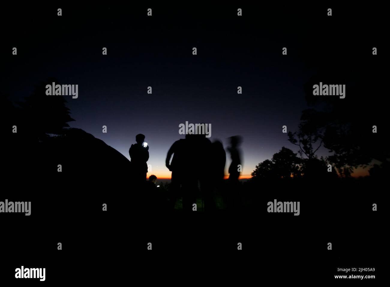 Group of people silhouette at sunset Stock Photo - Alamy