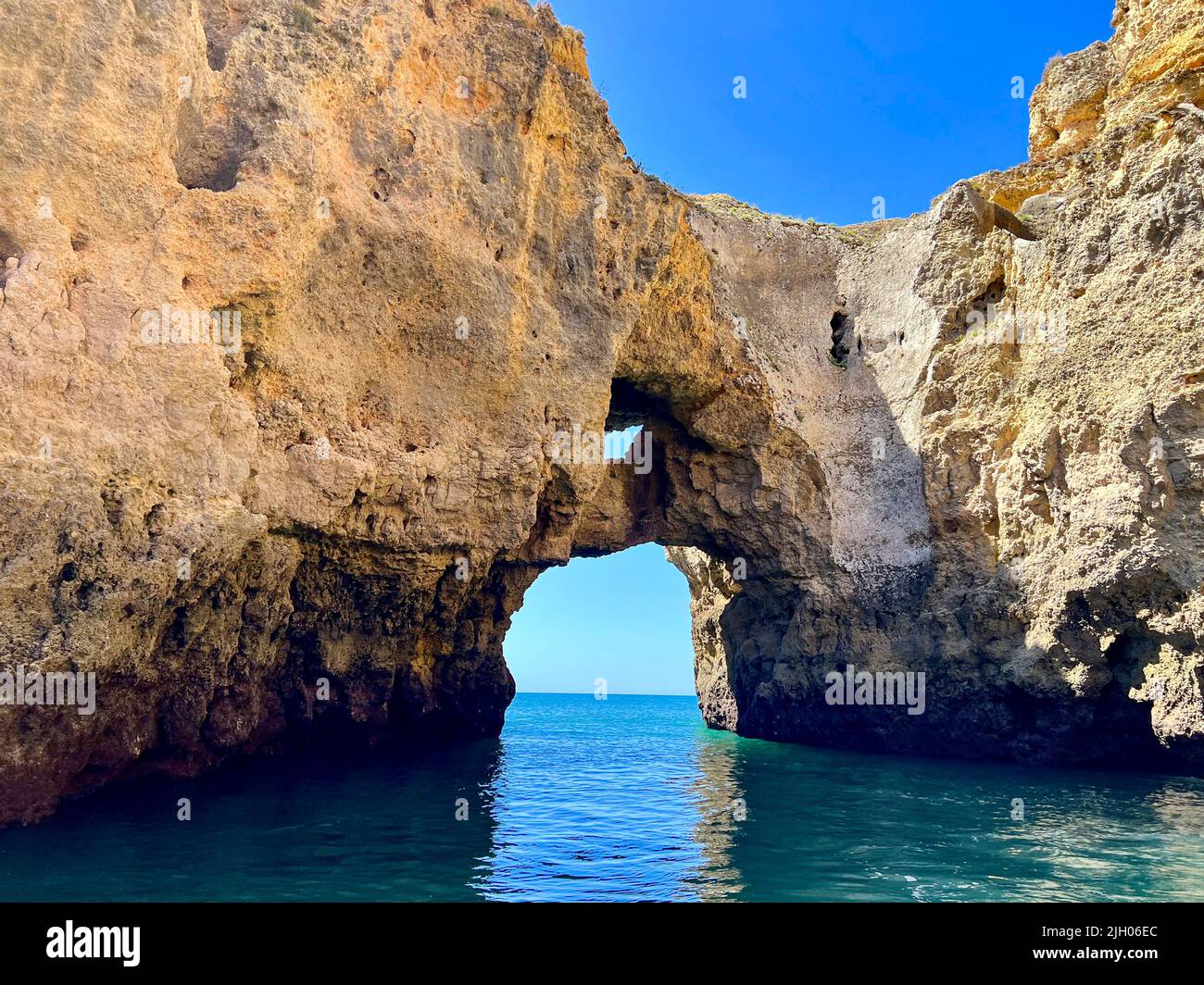 Ponta da Piedade headland is one of the finest natural features of the Algarve. Limestone coastline is formed of sea pillars, rock arches and grottos. Stock Photo