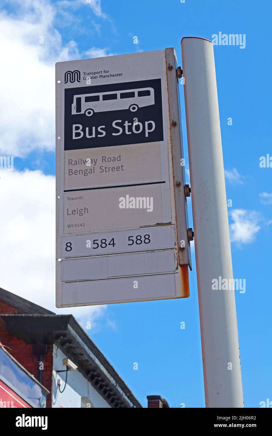 Leigh Bus stop , at Railway Road / Bengal St, TfGM bus services 8, 584 , 588, Transport For Greater Manchester, England, UK, WN7 4AX Stock Photo