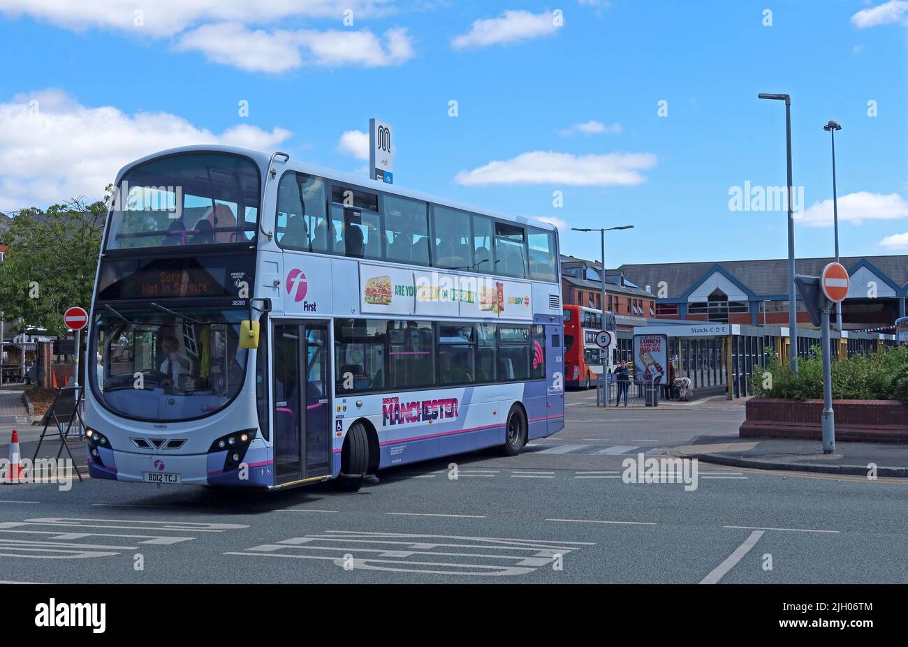 First Greater Manchester BD12TCJ Not in Service leaves Leigh Bus Station, King Street, Leigh, Greater Manchester, England, UK, WN7 4LP Stock Photo