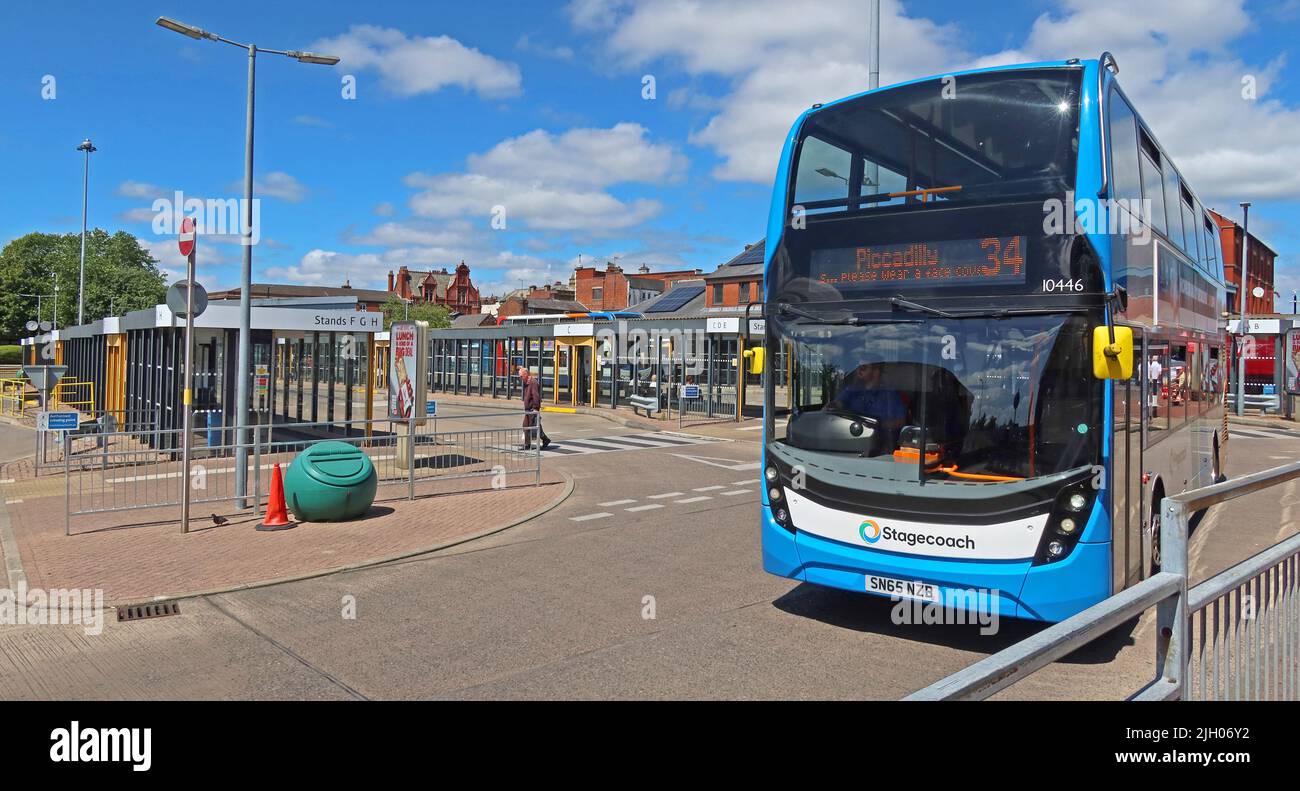 Stagecoach bus 34 for Piccadilly SN65NZB leaves  - Leigh Bus Station, King Street, Leigh, Greater Manchester, England, UK, WN7 4LP Stock Photo