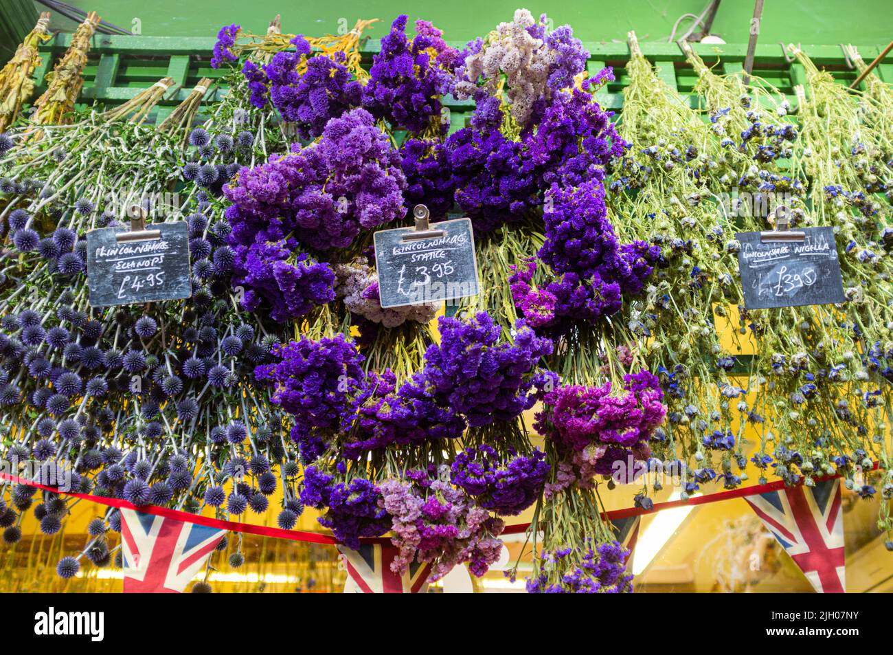 Dried flowers on display in a shop in Oxford market, UK 2022 Stock
