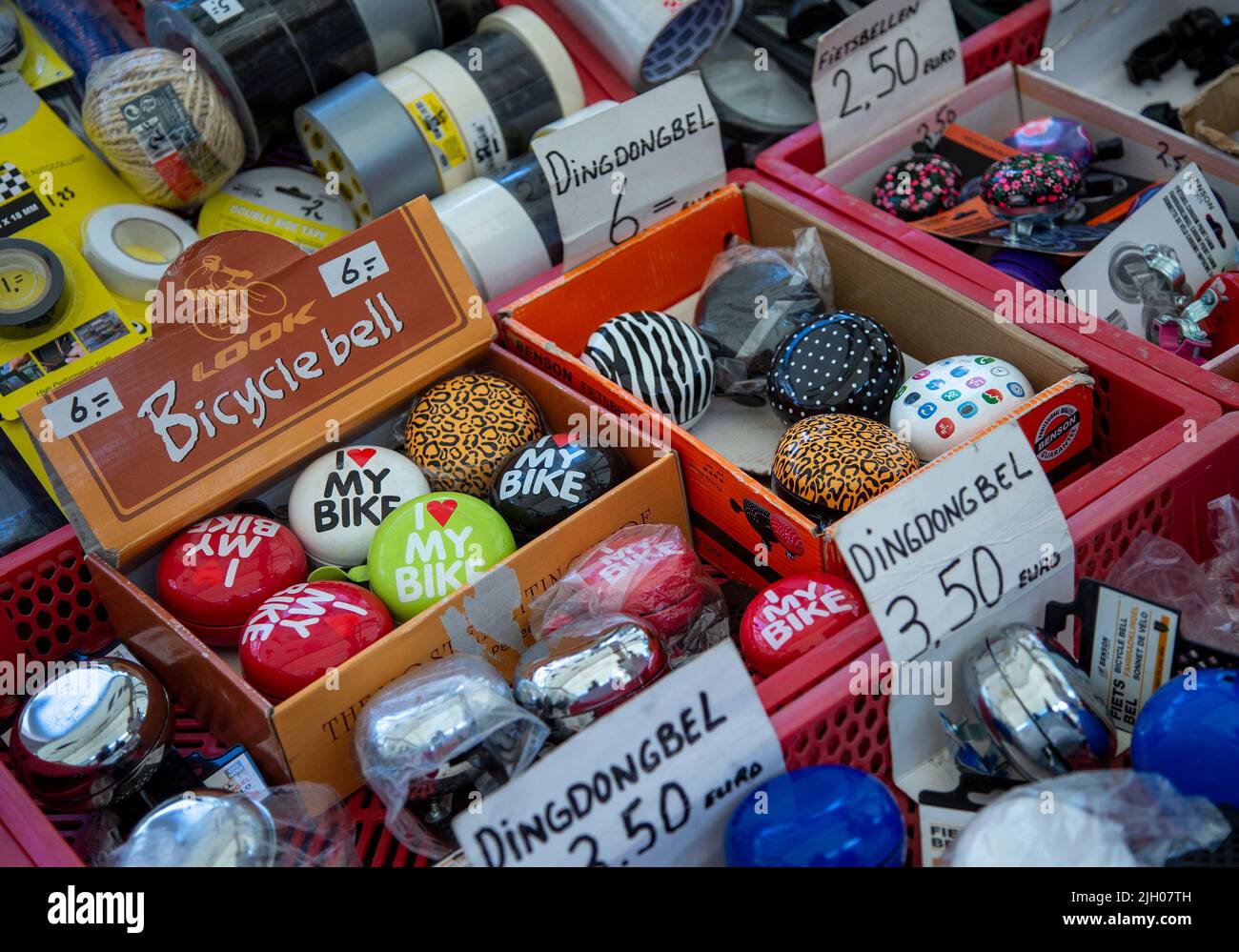 Bicycle bells for sale at a street market in Amsterdam Stock Photo