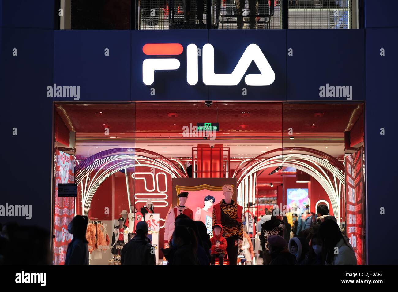 Shanghai,China-Jan.1st 2022: facade of Fila store exterior and brand logo  at night. sportswear company Stock Photo - Alamy