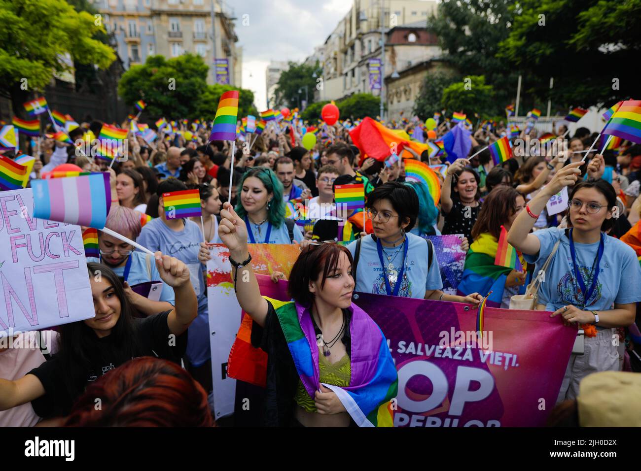Bucharest, Romania - July 9, 2022: Shallow depth of field (selective focus) with people attending the Bucharest Pride March on the streets of Buchares Stock Photo