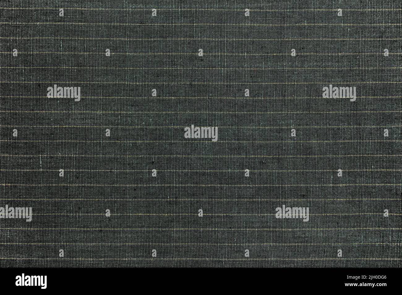 dark gray linen fabric with thin light yellow stripes. high-detailed texture background. Stock Photo