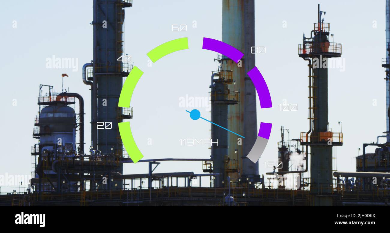 Image of speedometer over refinery Stock Photo