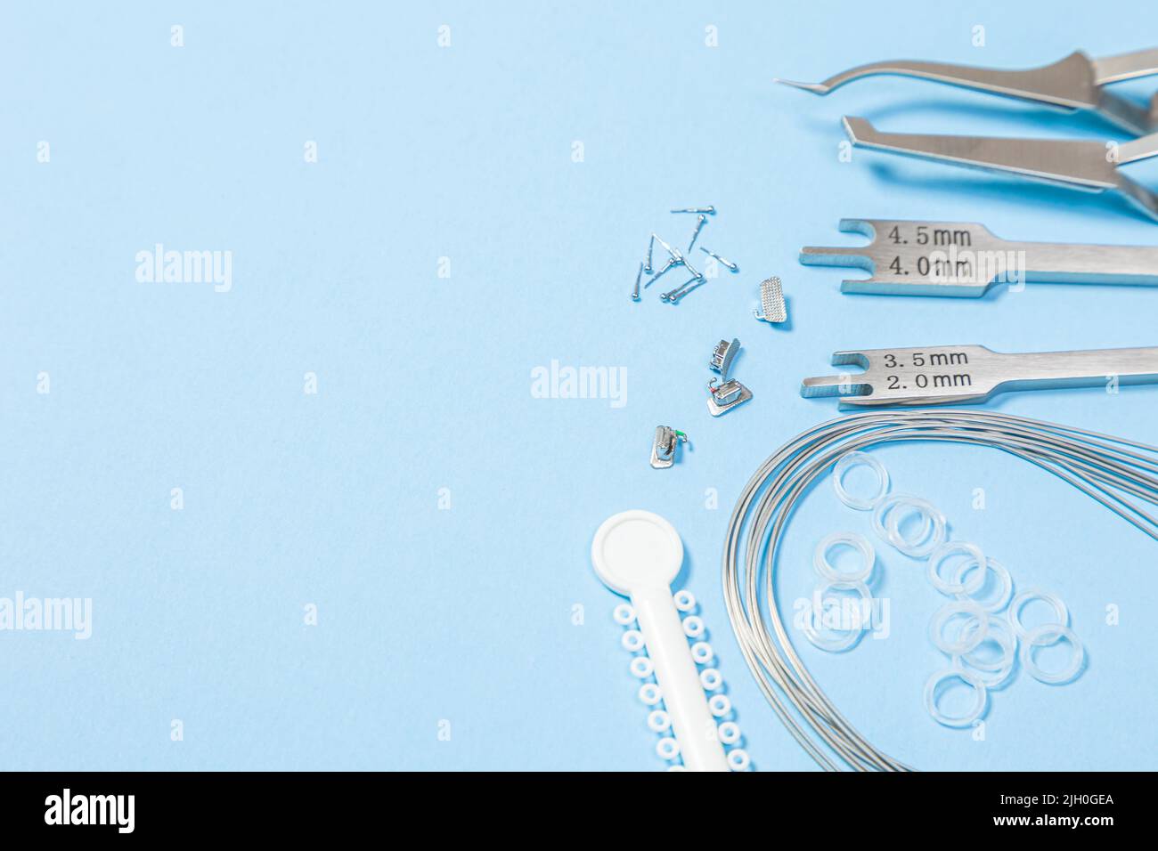 a set of special tools for an orthodontist to install braces for a