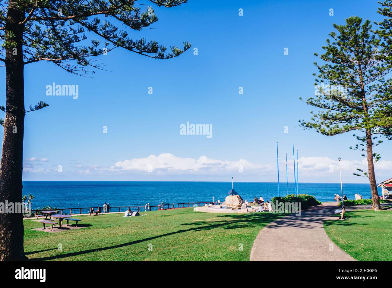 People in the park at Point Danger in Coolangatta on the Gold Coast Stock Photo