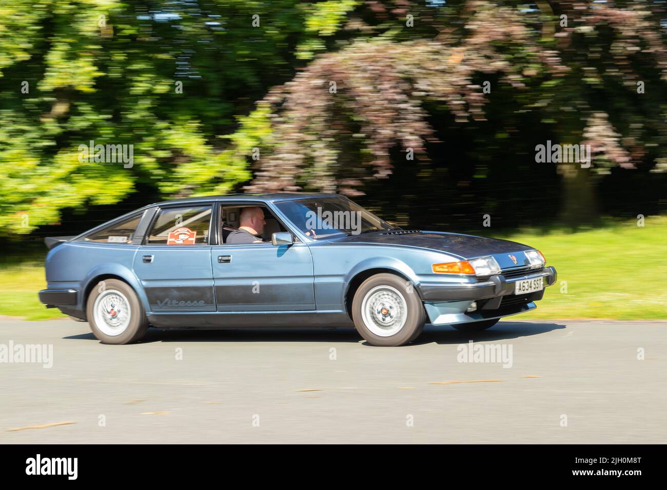 classic 1970s blue rover 3500 Sd1  car  driving on road Stock Photo