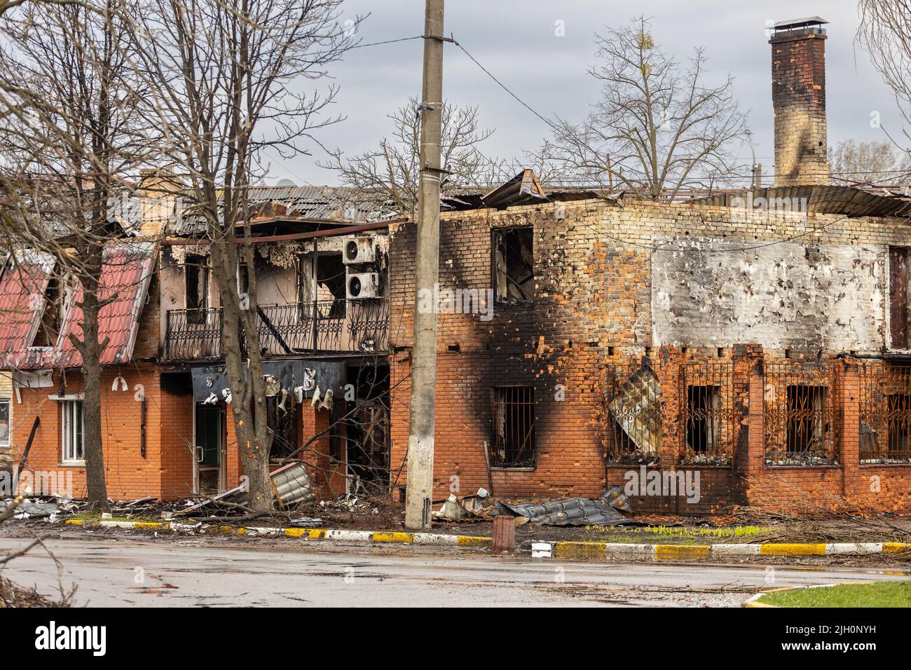 Irpin, Kyev region Ukraine - 09.04.2022: Cities of Ukraine after the Russian occupation. Destroyed buildings on the streets of Irpen. Broken, shelled Stock Photo