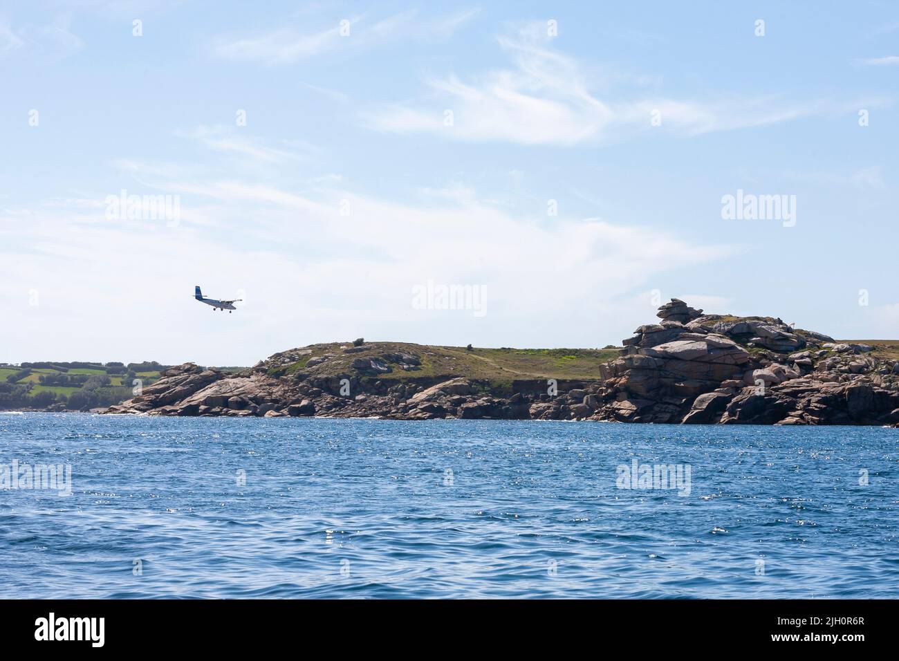 Skybus DHC-6 Twin Otter coming in to land at St. Mary's airport, St. Mary's, Isles of Scilly, UK Stock Photo