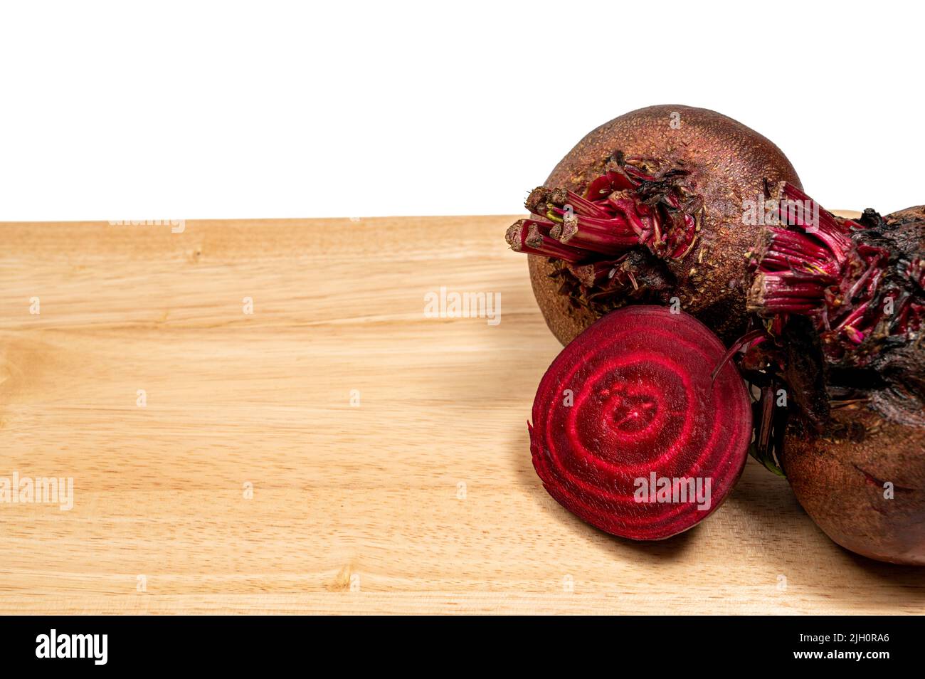 Fresh beets. Beets leaves and fresh beetroot. With copy space. Stock Photo