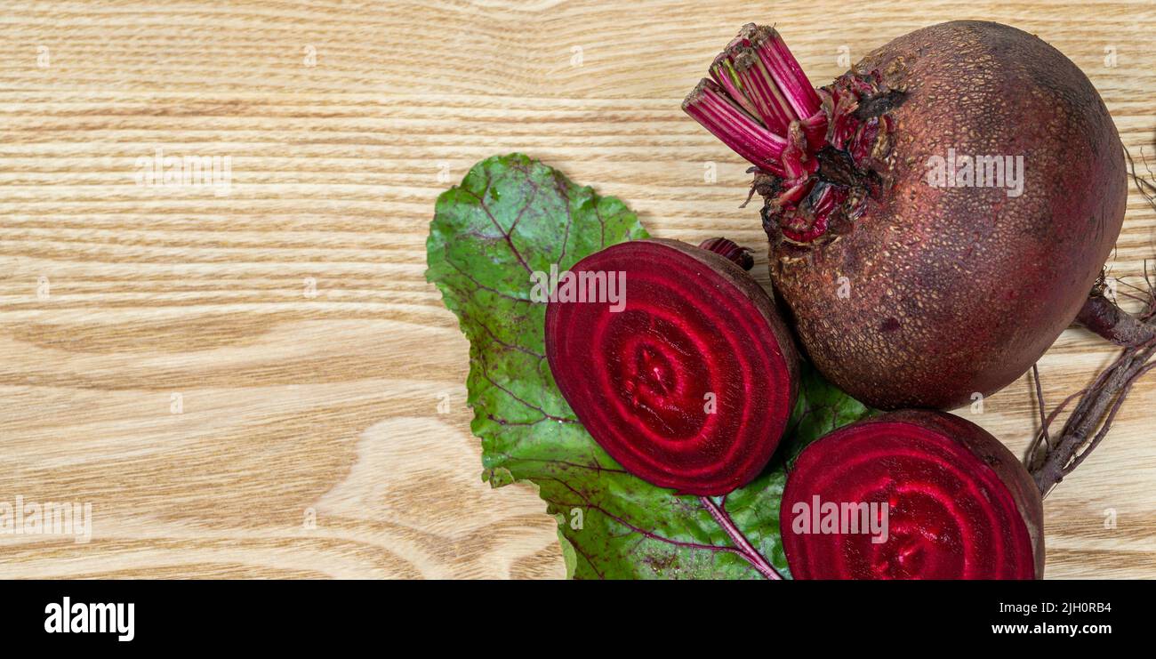 Fresh beets. Beets leaves and fresh beetroot. With copy space. Stock Photo