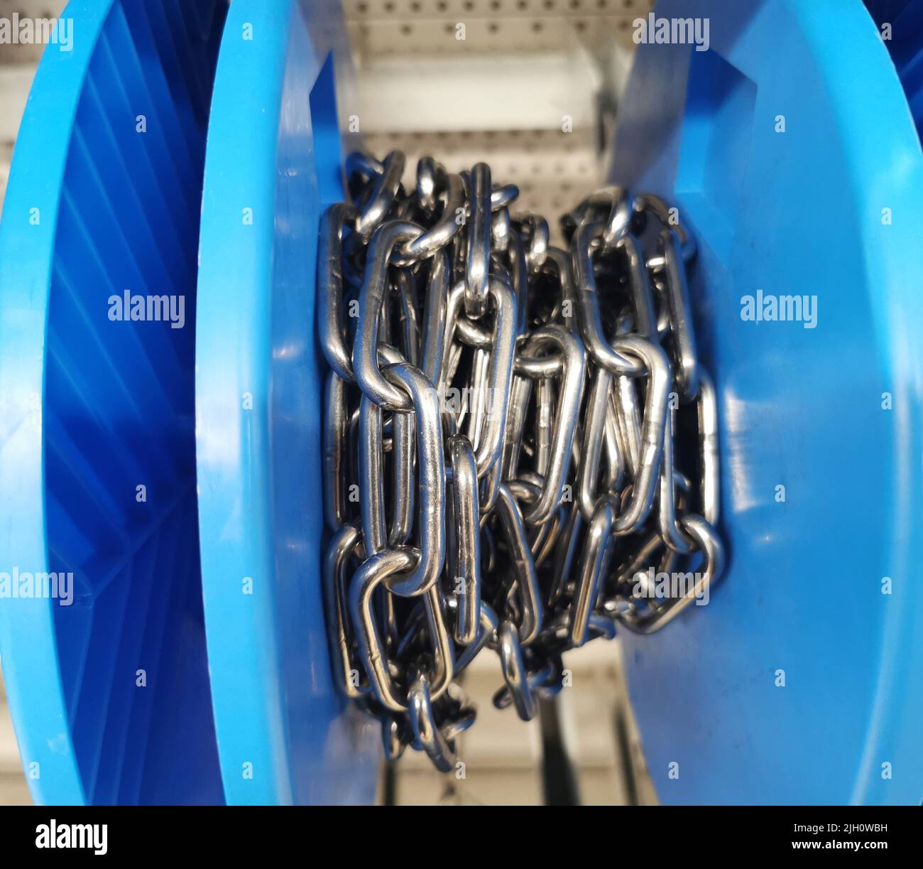 Roll of steel chain Stock Photo Alamy