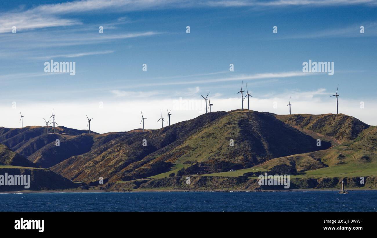 Meridian Energy Wind farm at Makara seen from the Interislander Ferry south of Wellington in Cook Strait, Aotearoa / New Zealand. Stock Photo
