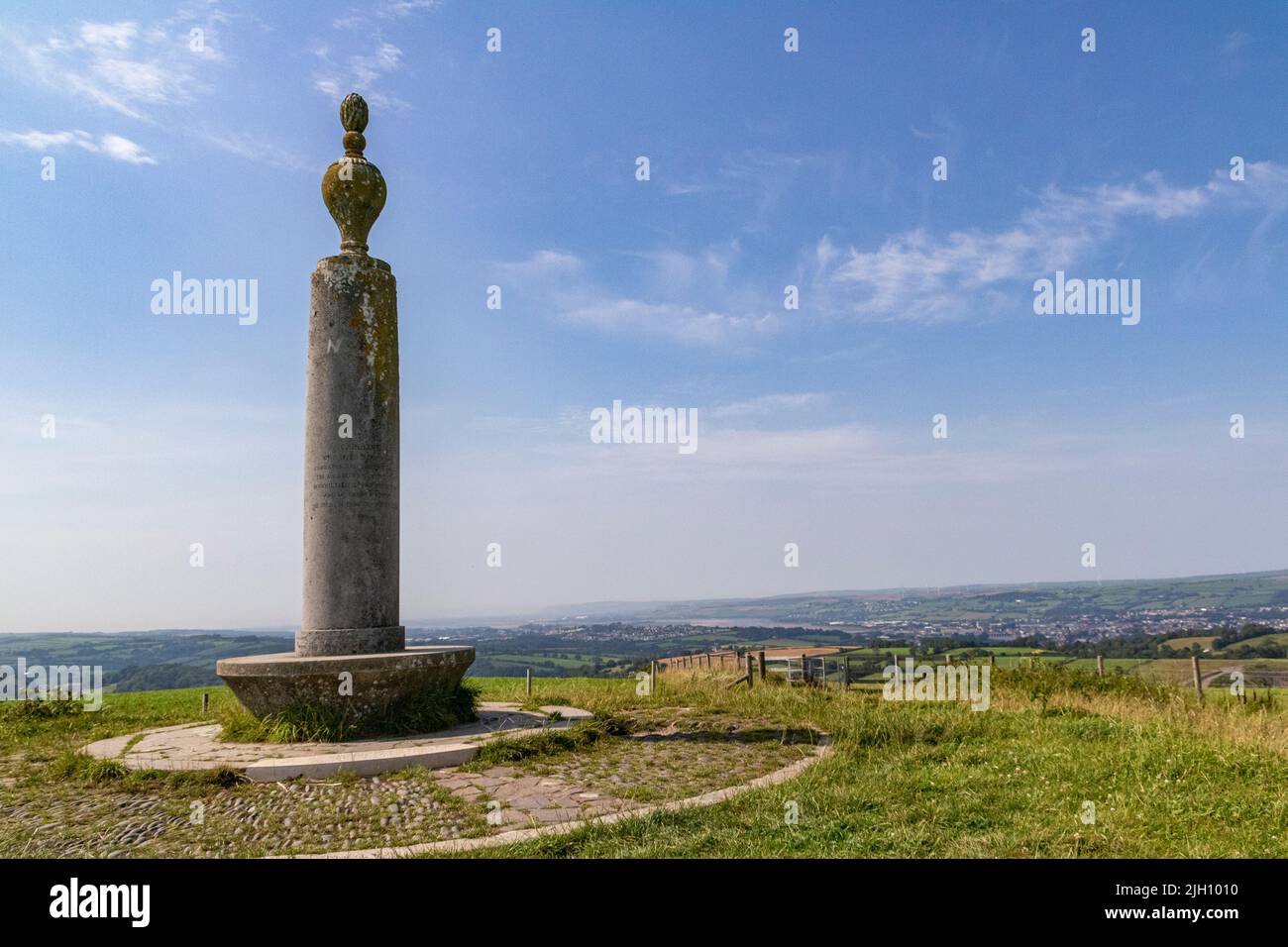 Detail of the Caroline Thorpe Monument on Codden Hill With a  Distant View of Barnstaple and the Taw Estuary. Stock Photo