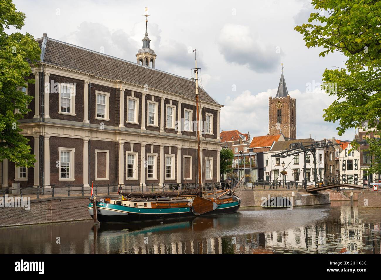 Schiedam, South Holland, The Netherlands, 26.06.2022, Korte Haven canal in Schiedam with a view of Sint Janskerk church Stock Photo