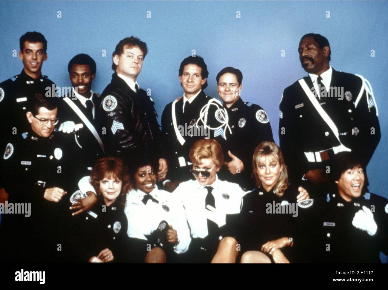 SCOTT,GRAF,WINSLOW,EASTERBROOK,GUTTENBERG,CATTRALL,SMITH, POLICE ACADEMY, 1984 Stock Photo