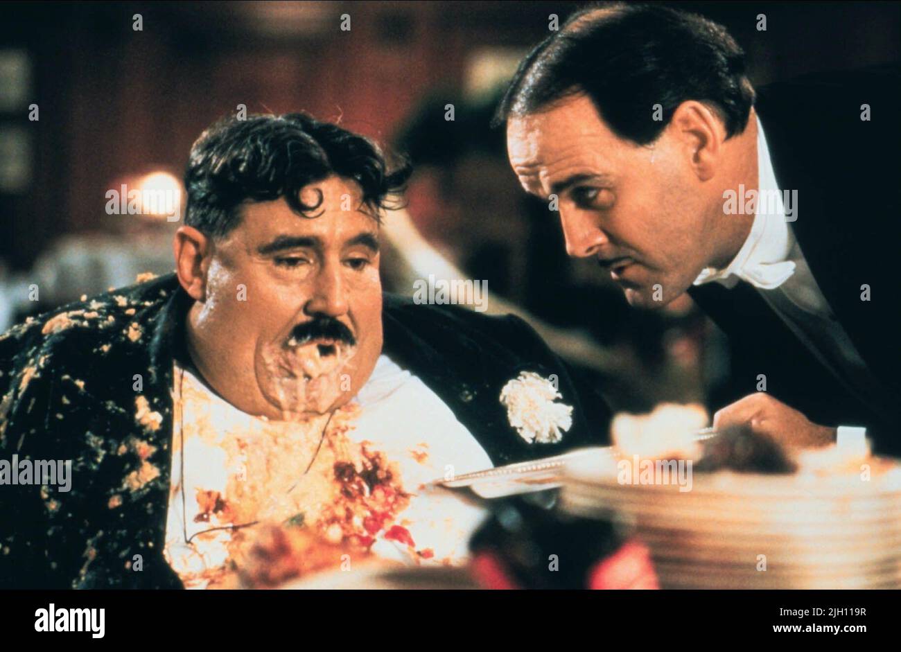 JONES,CLEESE, MONTY PYTHON'S THE MEANING OF LIFE, 1983 Stock Photo
