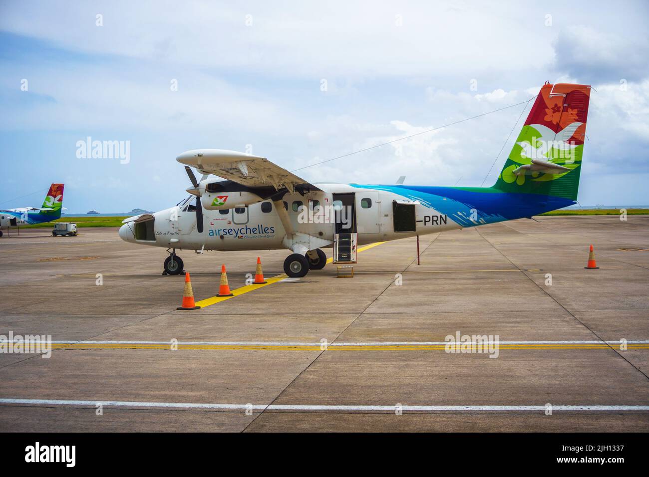 Air Seychelles small propeller aircraft at Mahe airport Stock Photo