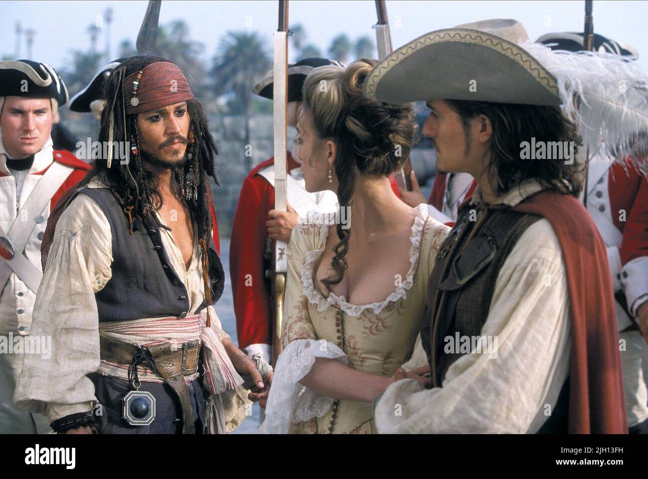 DEPP,KNIGHTLEY,BLOOM, PIRATES OF THE CARIBBEAN: THE CURSE OF THE BLACK PEARL, 2003 Stock Photo