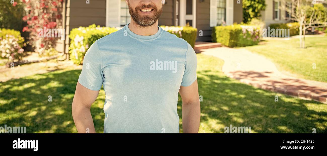 copped guy standing near house, ownership concept Stock Photo