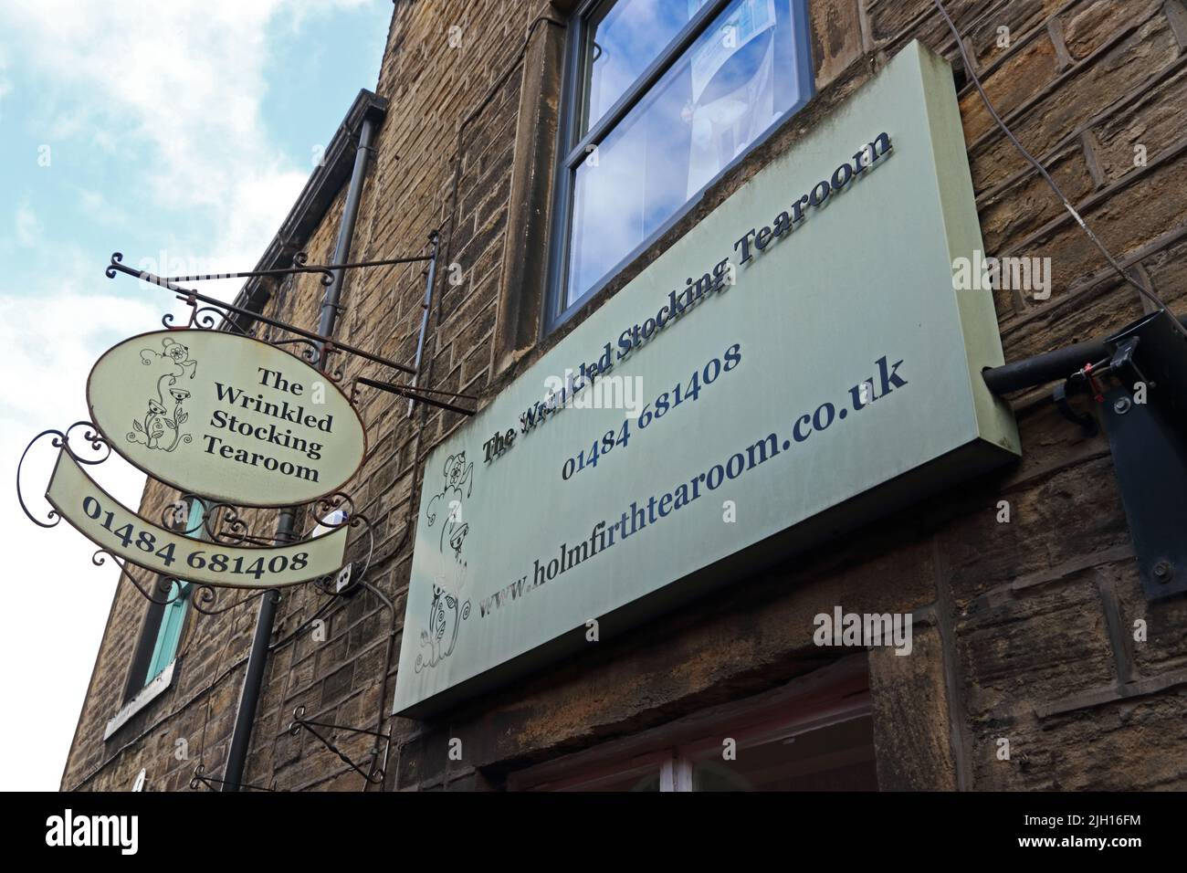 Signs outside The Wrinkle Stocking cafe, Holmfirth Stock Photo